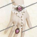 Великолепный ажурный браслет украшенный нежной розой, искусственными жемчугами и прекрасное кольцо.